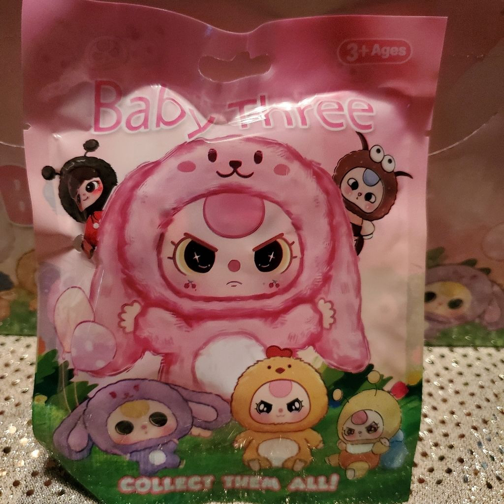 So Angry! take one home-Baby Three" Blind collectible small keychain or charm.